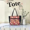 Everyday tote bag – pink and red hut motif print Everyday tote bag in pink and red hut motif print – cover photo, made by Sangeeta Enterprise, Nagpur