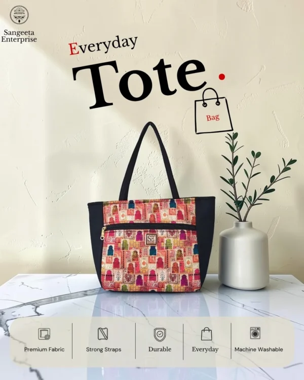 Everyday tote bag – pink and red hut motif print Everyday tote bag in pink and red hut motif print – cover photo, made by Sangeeta Enterprise, Nagpur