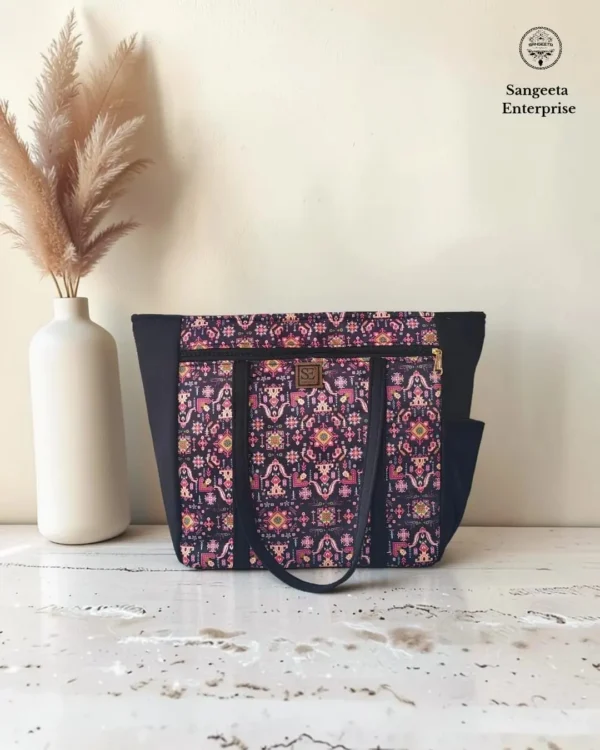 Jumbo tote bag – maroon ethnic motif print Jumbo tote bag in maroon ethnic motif print, made by Sangeeta Enterprise, Nagpur