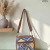 Jute premium square bag in navy and yellow geometric print, made by Sangeeta Enterprise, Nagpur