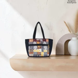 Kitty handy bag in yellow and brown patchwork print, made by Sangeeta Enterprise, Nagpur