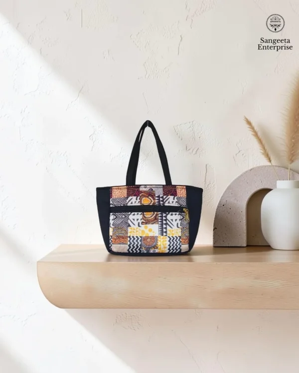 Kitty handy bag in yellow and brown patchwork print, made by Sangeeta Enterprise, Nagpur