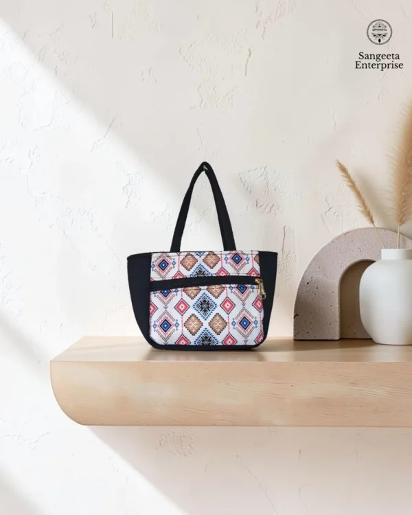 Kitty handy bag in pink and blue diamond print, made by Sangeeta Enterprise, Nagpur