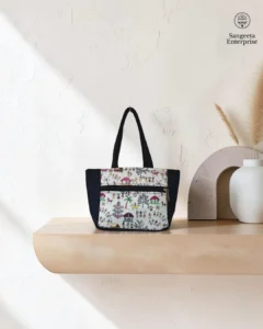 Kitty handy bag in cream folk motif print, made by Sangeeta Enterprise, Nagpur