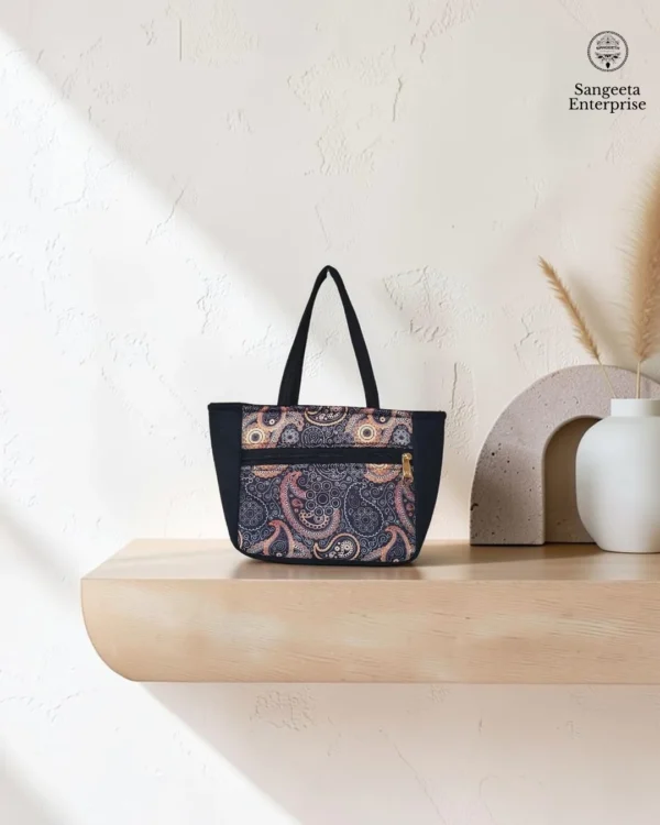 Kitty handy bag in dark paisley print, made by Sangeeta Enterprise, Nagpur