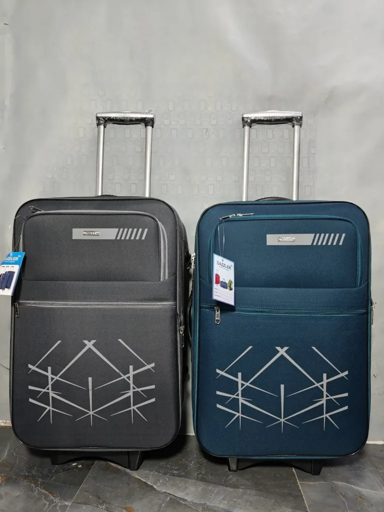 Two soft trolley suitcases with printed design