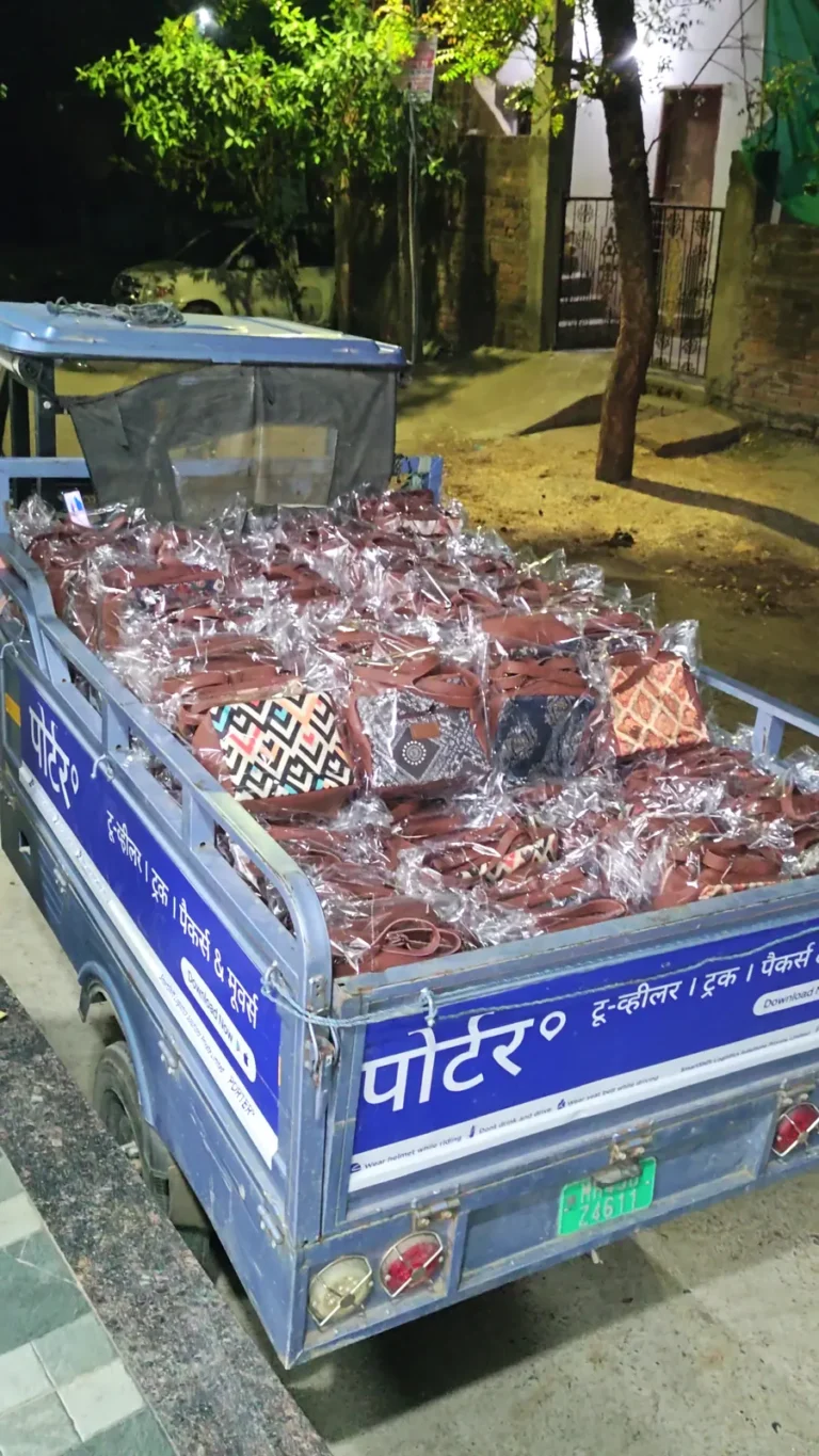 Delivery vehicle loaded with packed bags for dispatch from Nagpur