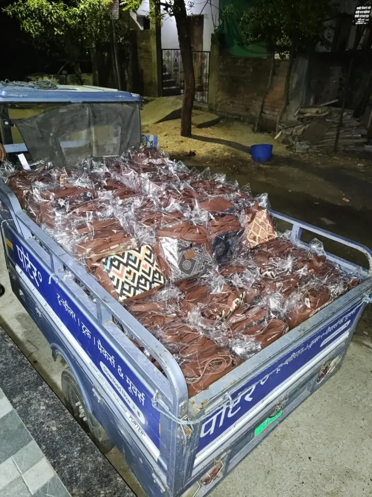 Three-wheeler loaded with bag cartons for dispatch